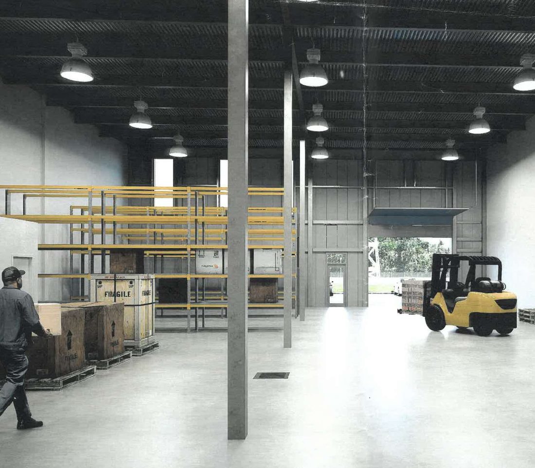 Intérieur d'un condo industriel avec mezzanine et quai de chargement